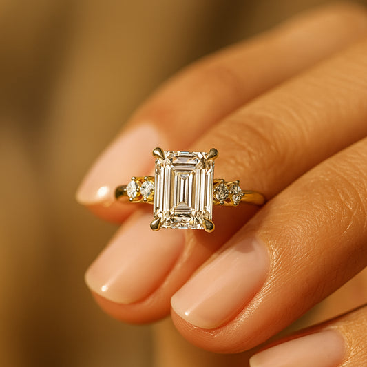 Elegant Three Stone Emerald Cut Moissanite Ring Featuring Sparkling Side Stones, Crafted For A Timeless And Luxurious Bridal Look