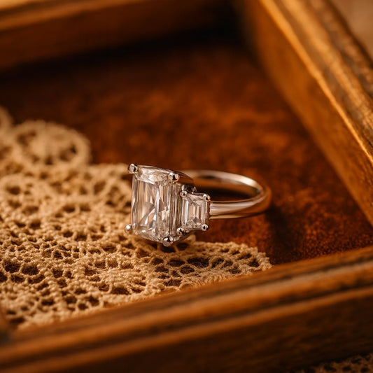 Three Stone Emerald Cut Diamond Engagement Ring In Platinum