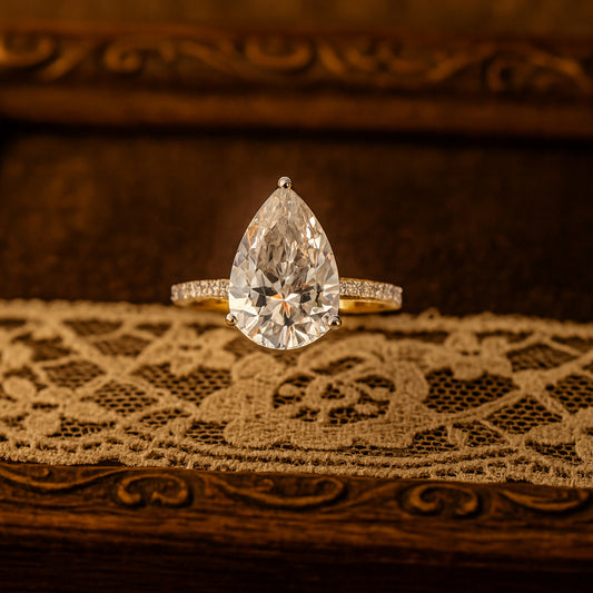 Pear-shaped diamond engagement ring with pave band Romantic Brilliance
