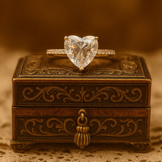 Close-up of Diiro gold heart-shaped diamond solitaire ring showing elegant craftsmanship.