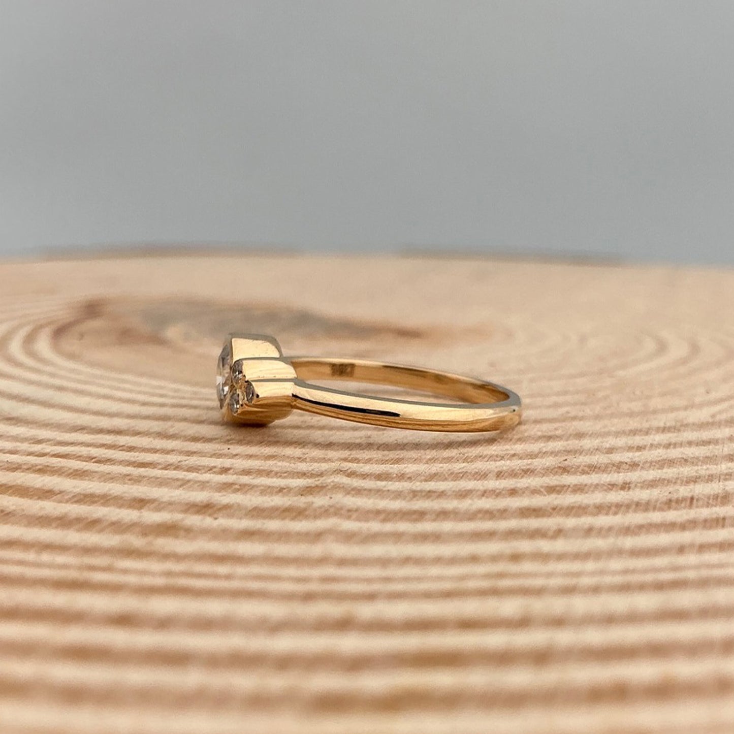 Brilliant Moissanite Engagement Ring With Square Prong Setting And Unique Ribbed Band Detail