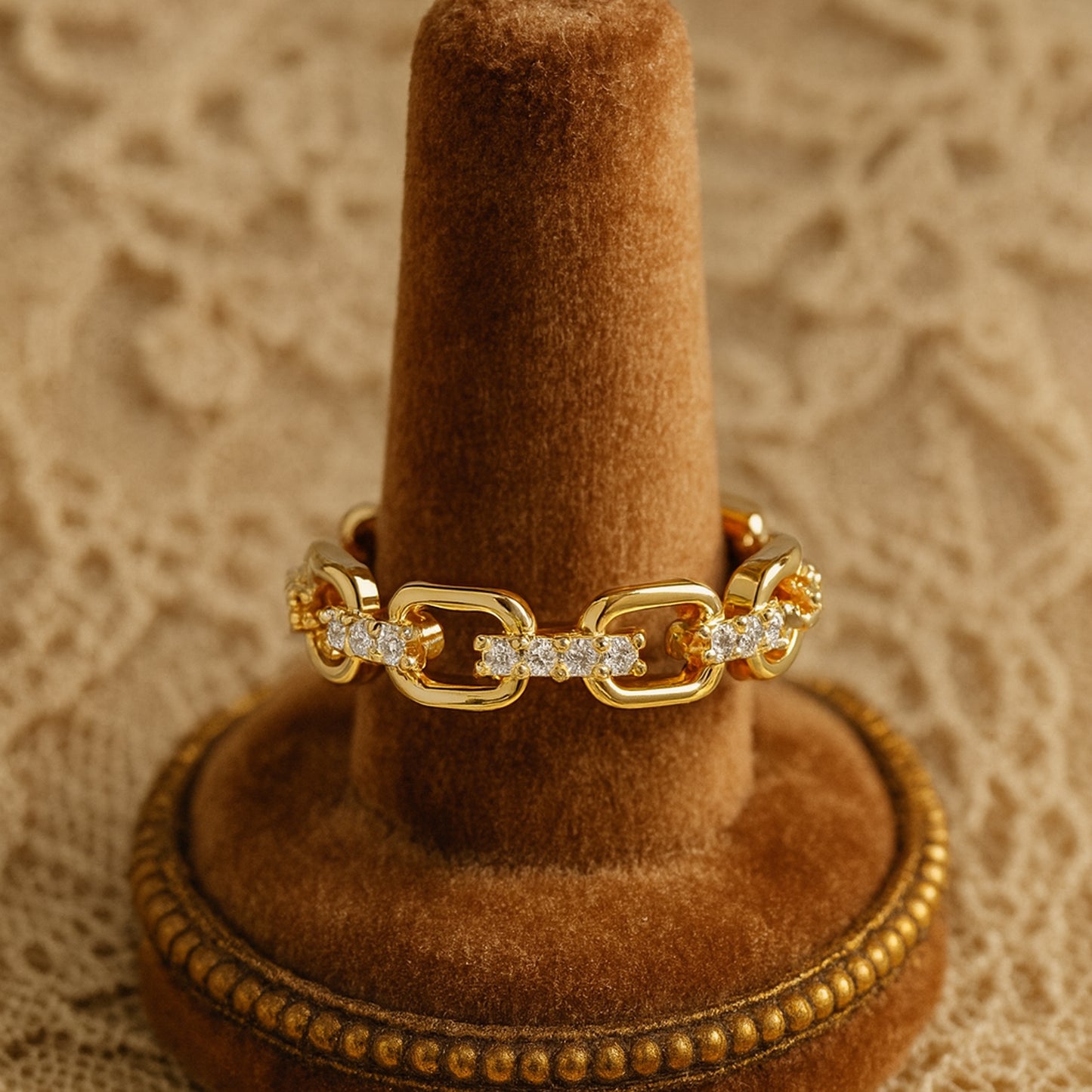 Luxury gold chain link ring with sparkling diamond accents