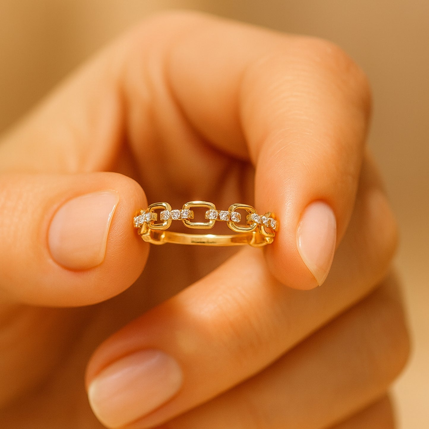 Luxury gold chain link ring with sparkling diamond accents