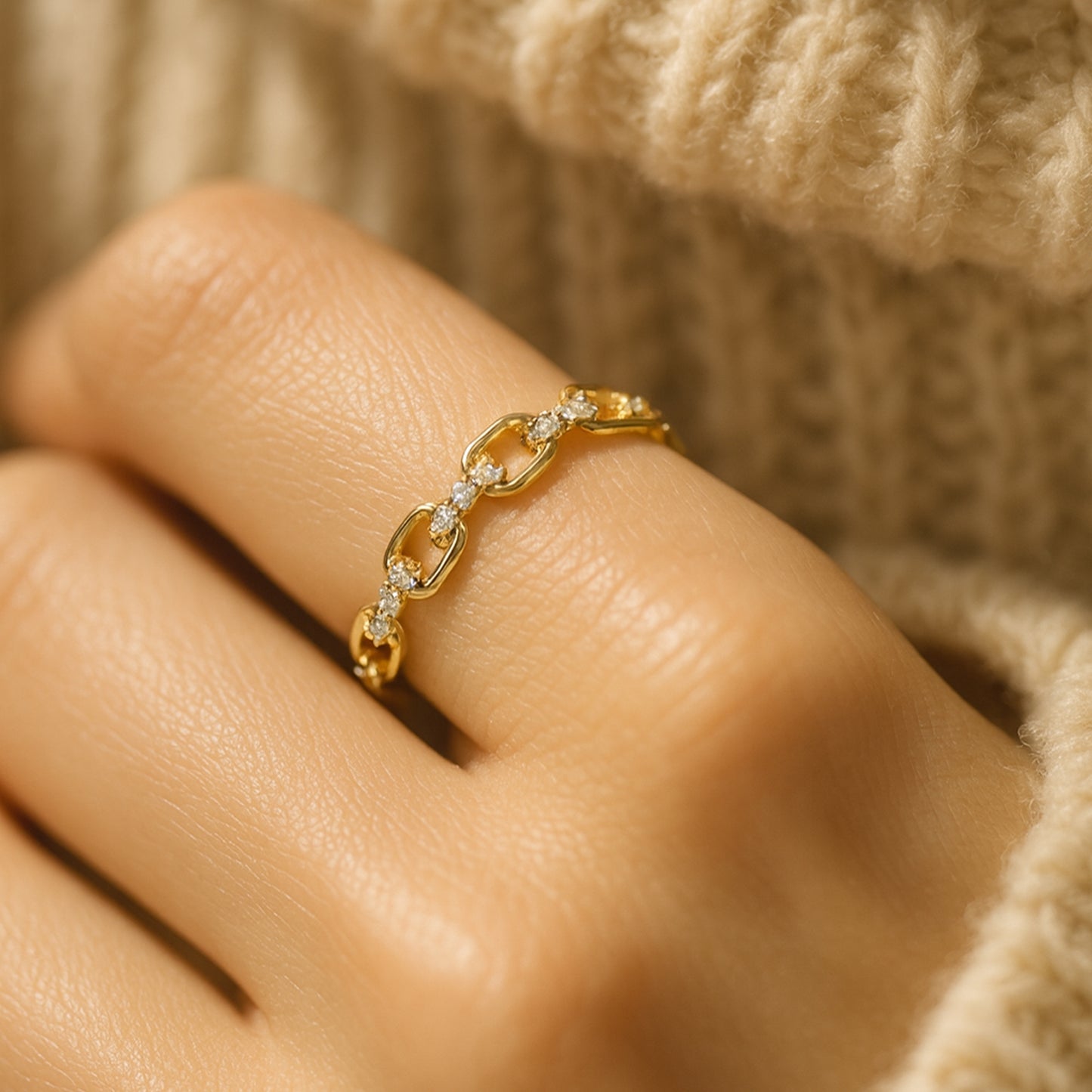 Luxury gold chain link ring with sparkling diamond accents