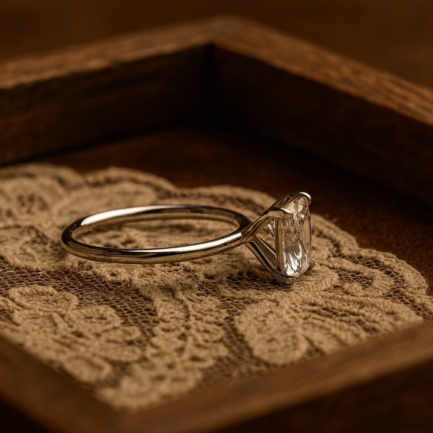 Elegant Gold Moissanite Ring With Cushion Cut Stone Reflecting Diamond Sparkle, Perfect For Weddings And Engagements.