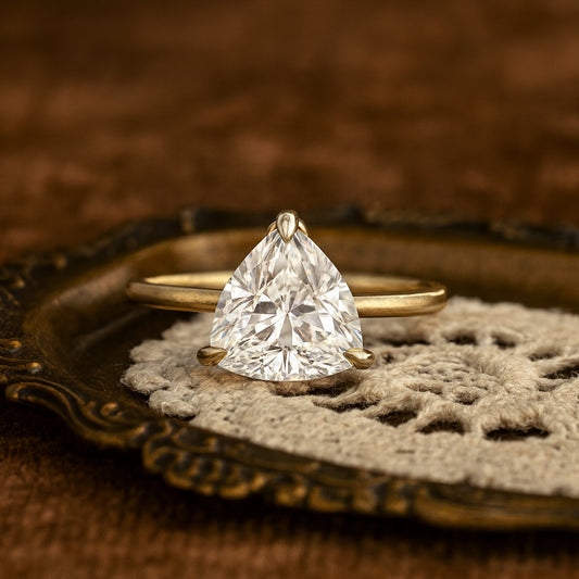 Trillion Cut Moissanite Solitaire Ring For Brides, Crafted With Diamond Look Finish And Gold Band.