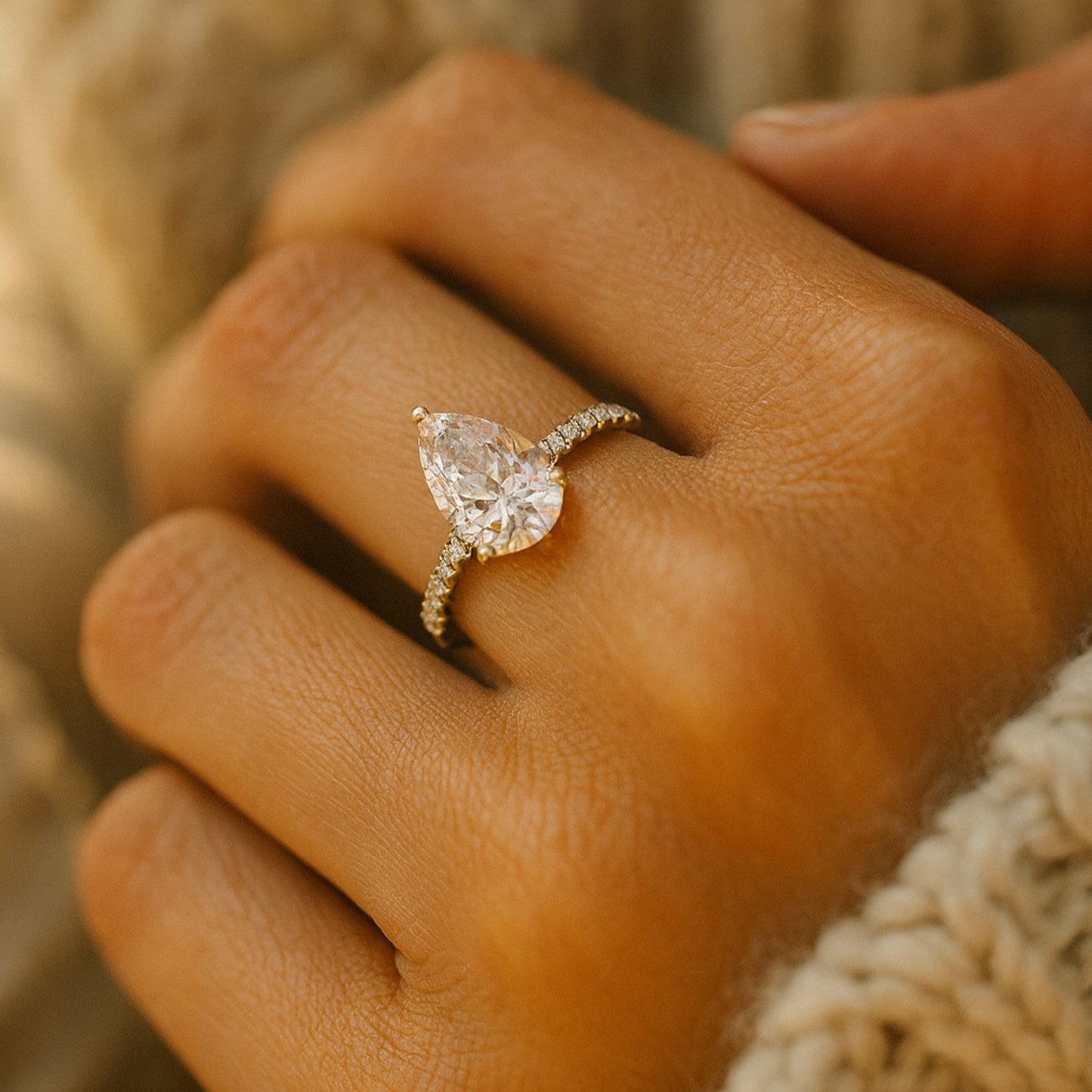 Diiro Pear Diamond Solitaire Ring In Gold Featuring A Brilliant Teardrop-Cut Diamond And Pavé Band For Timeless Elegance.