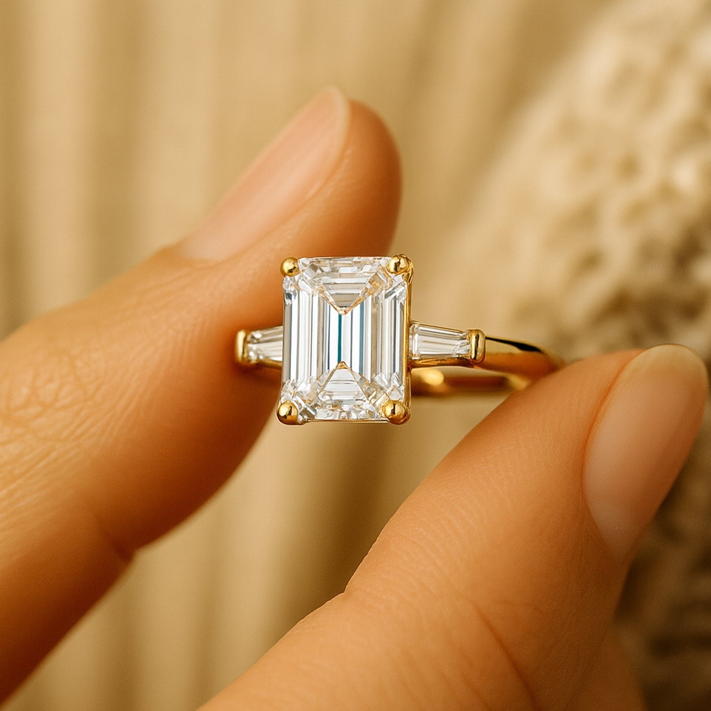 Three-Stone Emerald-Cut Diamond Ring On Hand - Timeless Bridal Jewelry For Women