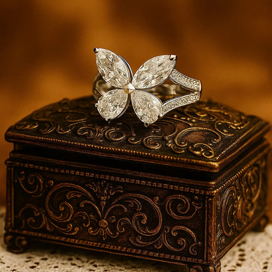 Modern White Gold Moissanite Ring With Diamond-Like Marquise Cuts Forming A Unique Flower Pattern