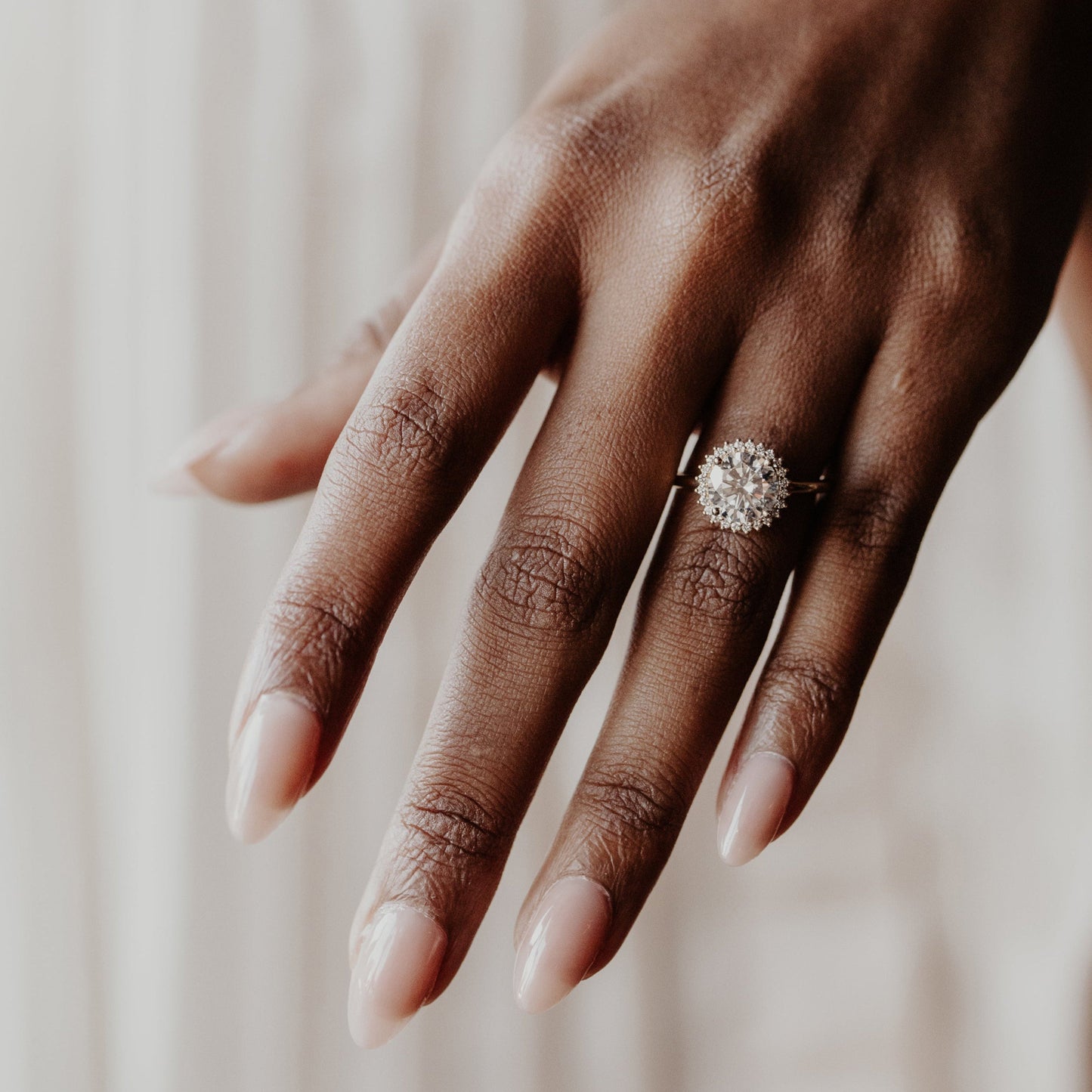 Promise Ring in 14K gold with round diamond & starburst halo on a thin band. Diiro’s USA-best fine jewelry for engagements, anniversaries & special gifts.