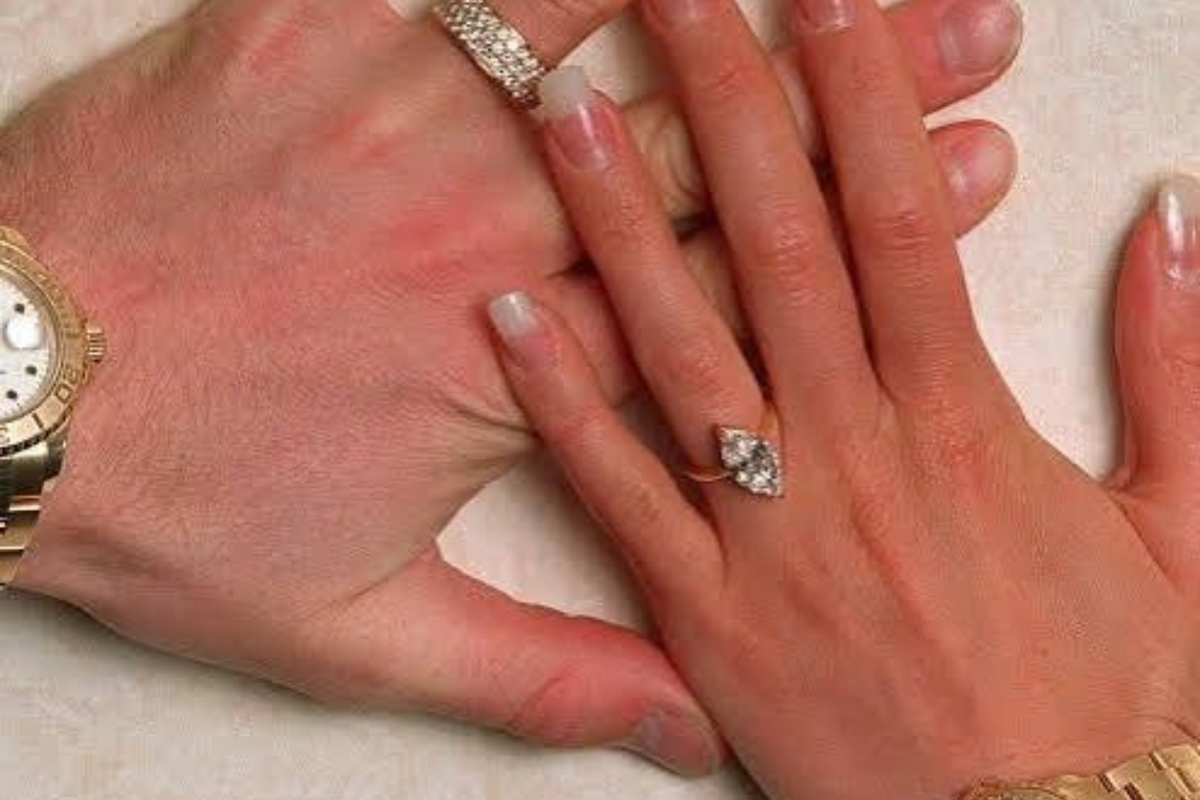 Elegant pear shaped diamond engagement ring with halo setting and luxury bridal jewellery close-up