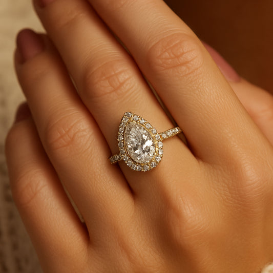 Elegant 18K Yellow Gold Pear Cut Moissanite Wedding Ring With Halo And Pave Setting Featuring Diamond Inspired Sparkle