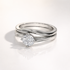 Twisted swirl solitaire engagement ring with round diamond
