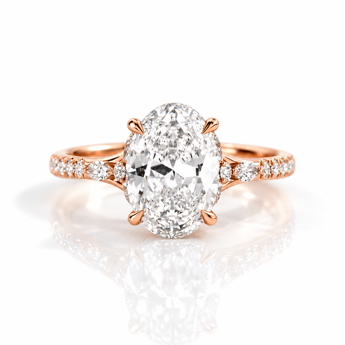 18K rose gold vermeil oval-cut engagement ring with pavé diamond band and four-prong setting on a white background.