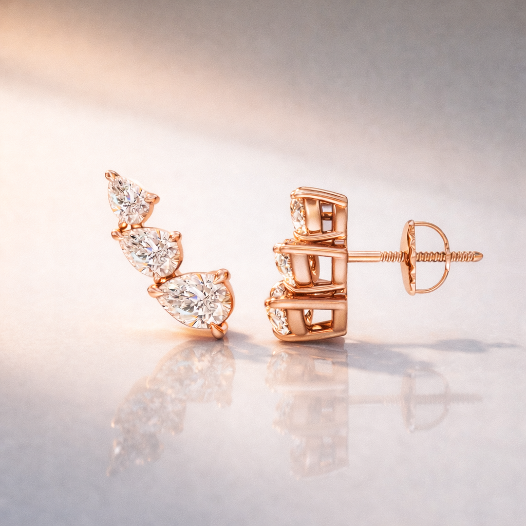 Pear Shaped Diamond Stud Earrings With Three Pear Cut Stones
