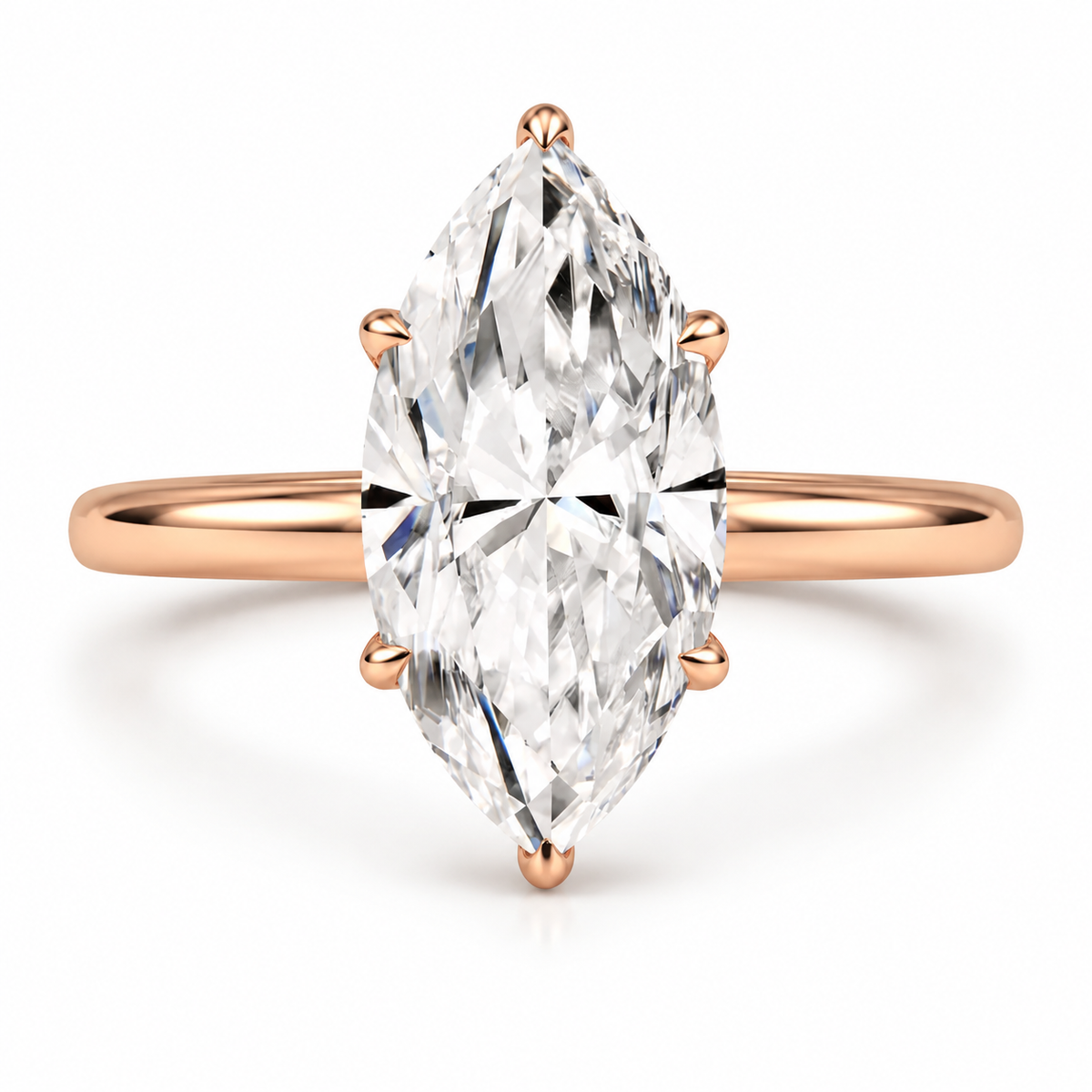 A rose gold ring featuring a large marquise-cut clear gemstone in a six-prong setting, shown on a clean white background.