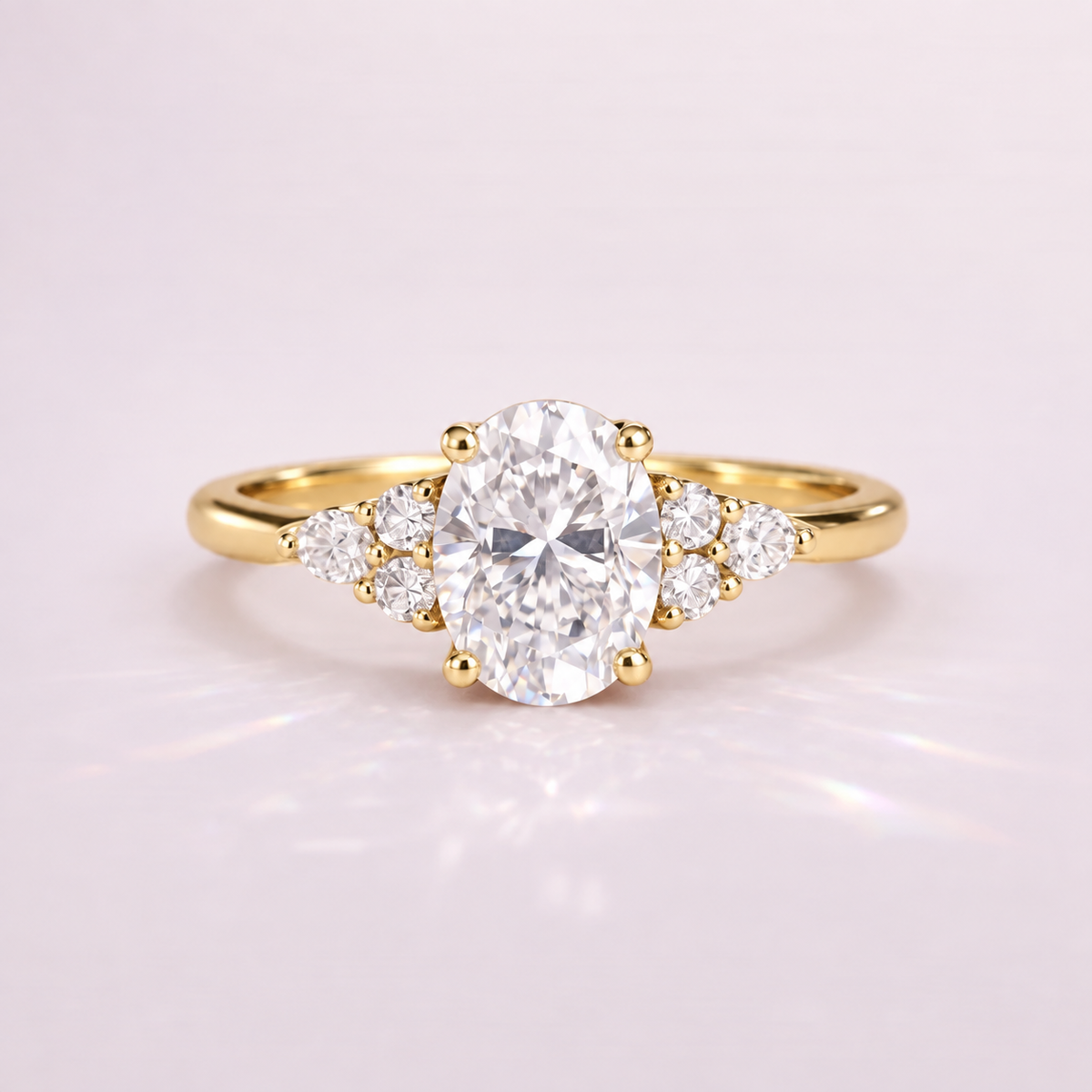 Oval Cut Diamond Engagement Ring in Gold with Round Diamond Side Stones