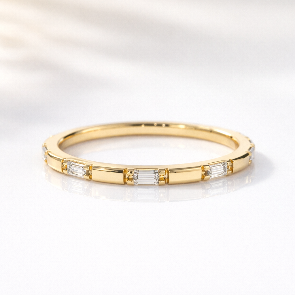 Dainty Yellow Gold Baguette Cut Wedding Band With Prong Set Stones
