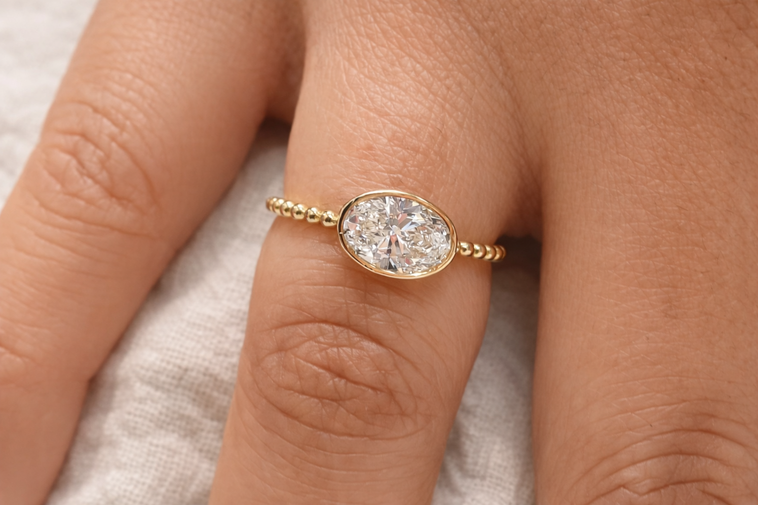 East West Oval Diamond Ring Bezel Engagement Ring Yellow Gold Band.

