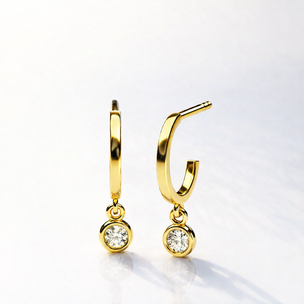 Bezel Set Diamond Huggie Hoop Earrings In Yellow Gold
