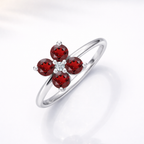 Gold Flower Ring With Garnet Stones
