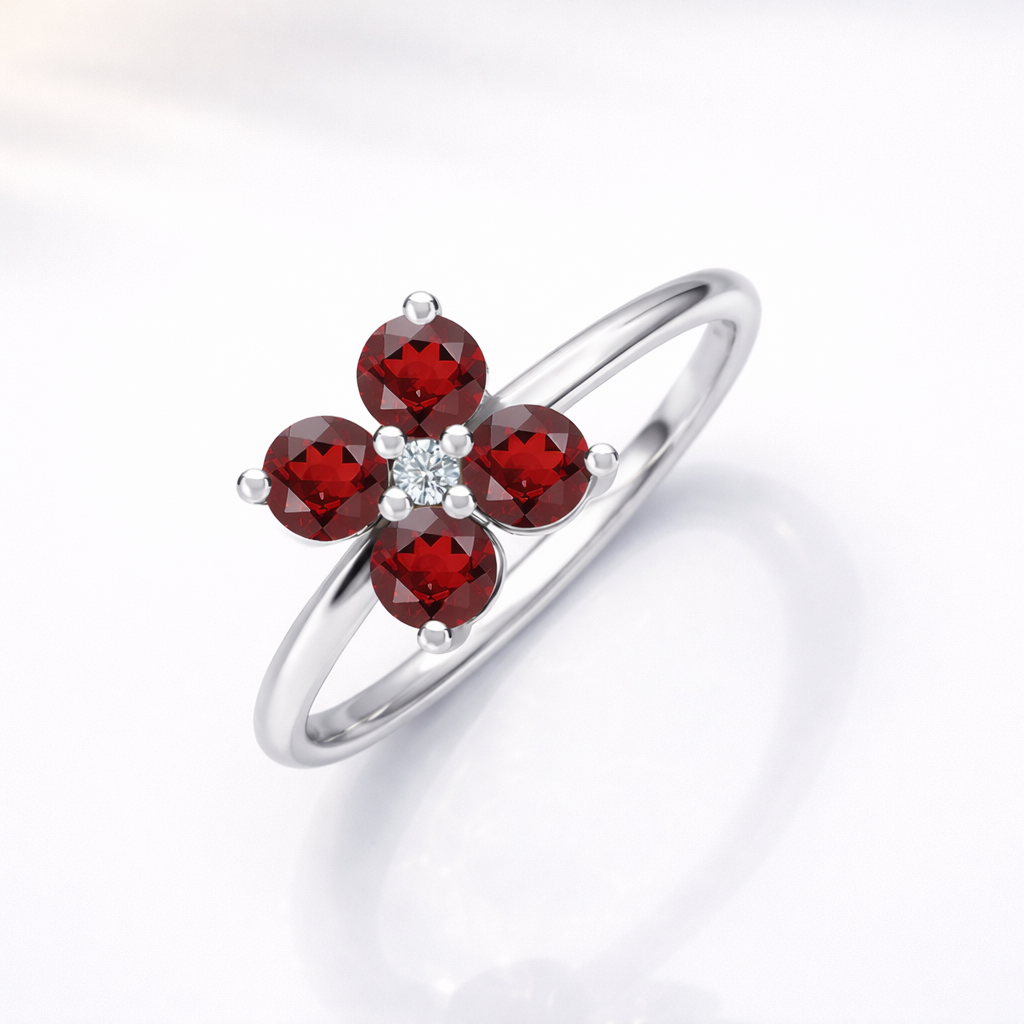 Gold Flower Ring With Garnet Stones
