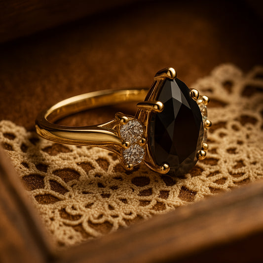 Modern Pear Cut Black Diamond Engagement Ring with White Diamonds

