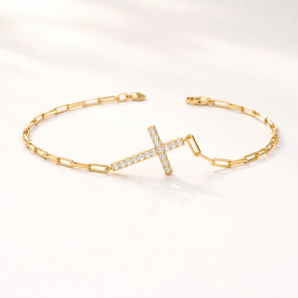 Gold cross bracelet with diamond paperclip chain
