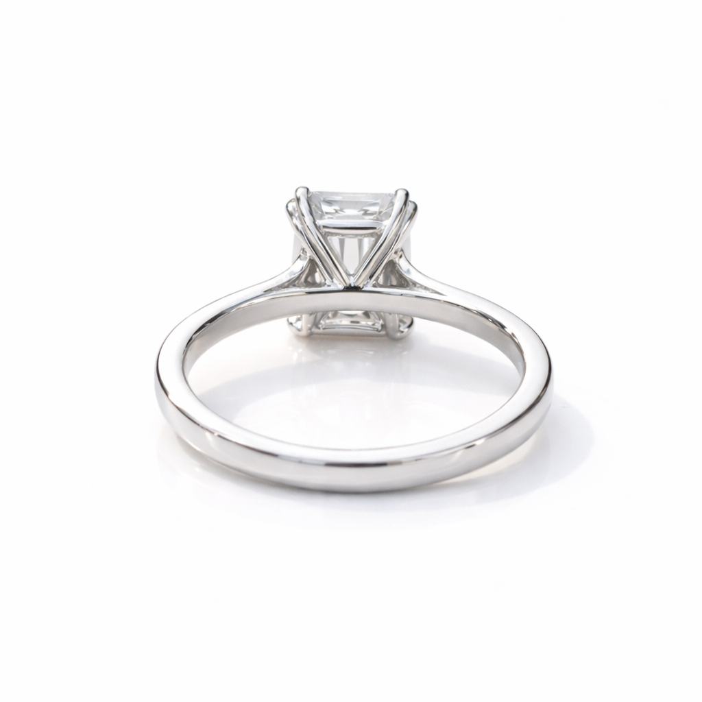 Cathedral Engagement Ring With 3 Carat Emerald Cut Diamond
