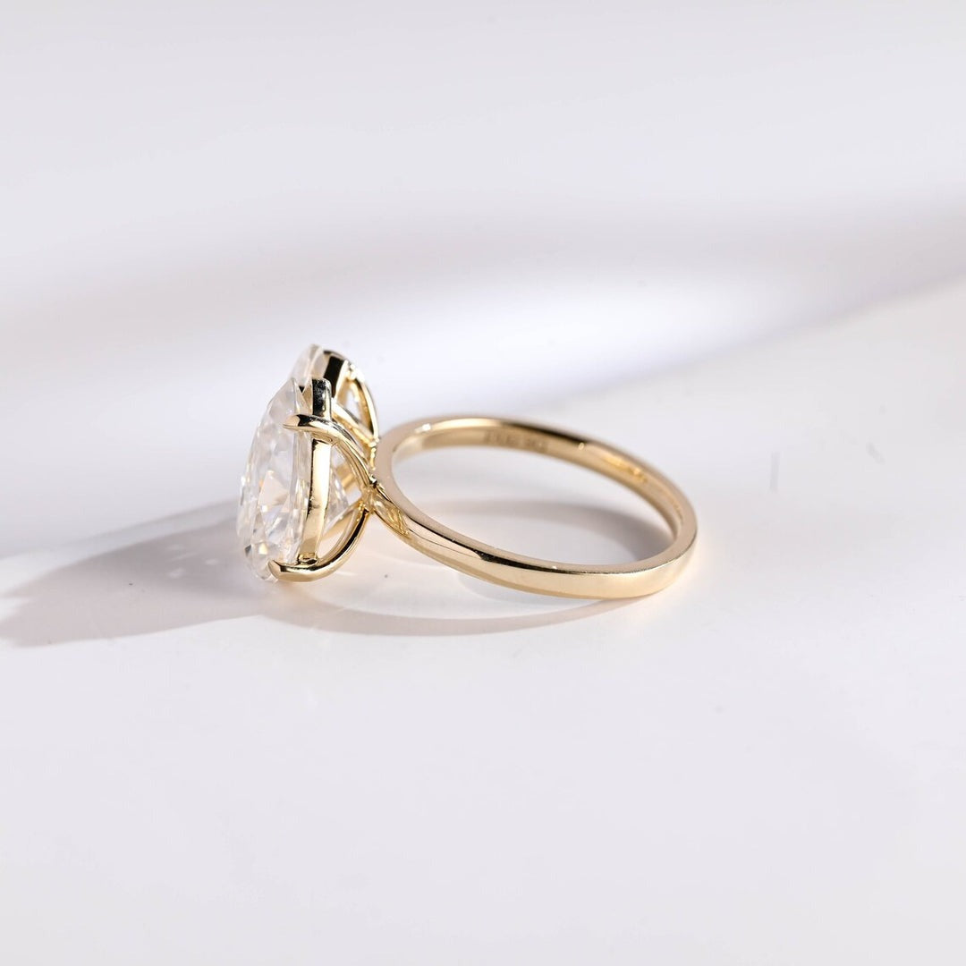 Two Stone Engagement Ring Marquise And Pear Cut Diamond Yellow Gold Setting.
