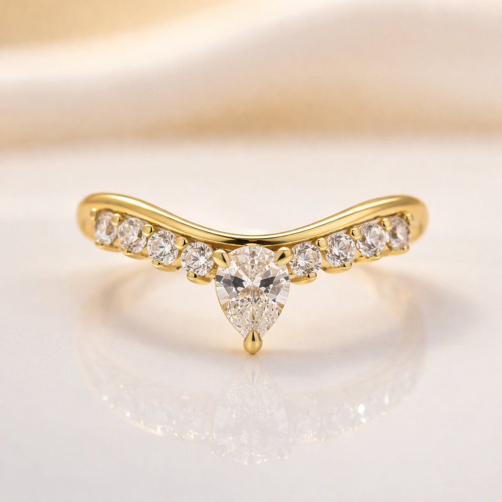 Crown Wedding Band With Pear Cut Diamond Center Stone In Yellow Gold