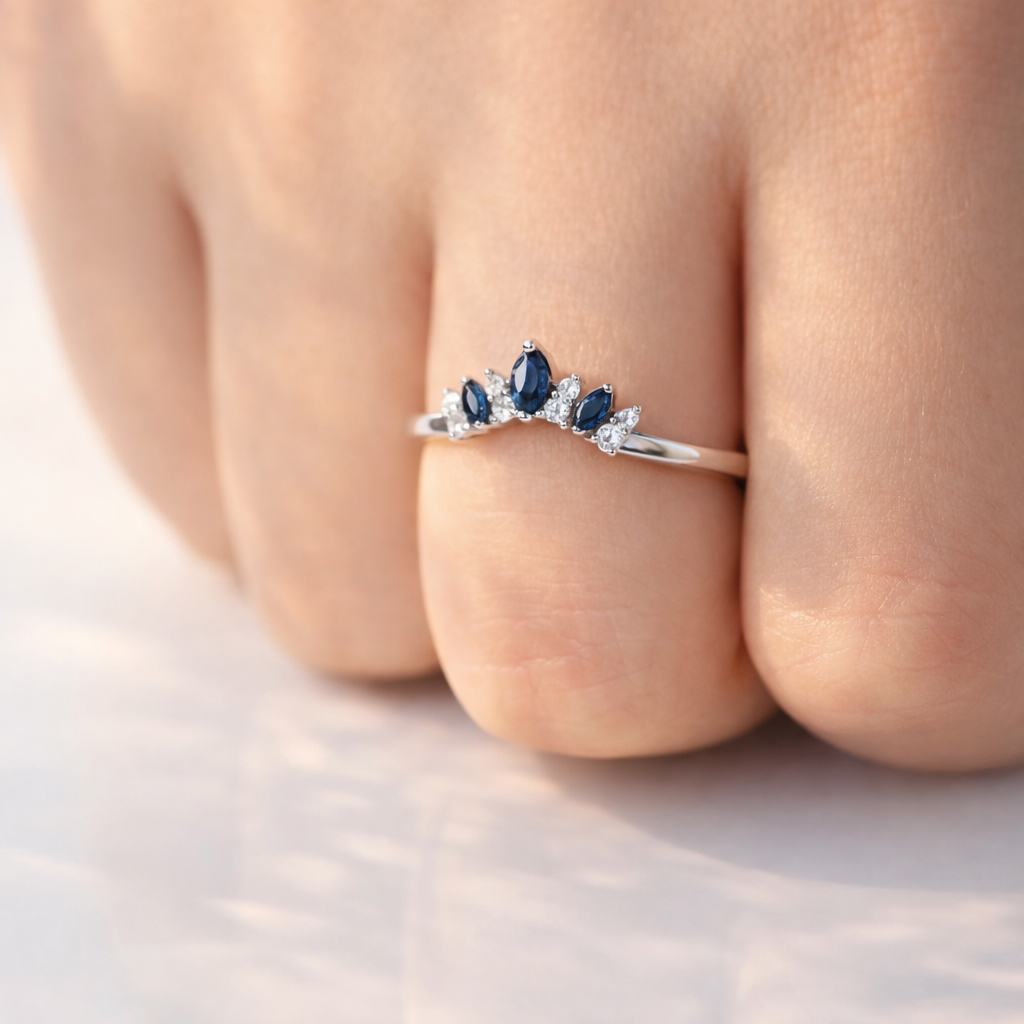 White Gold Curved Wedding Band With Blue Sapphire And Diamonds
