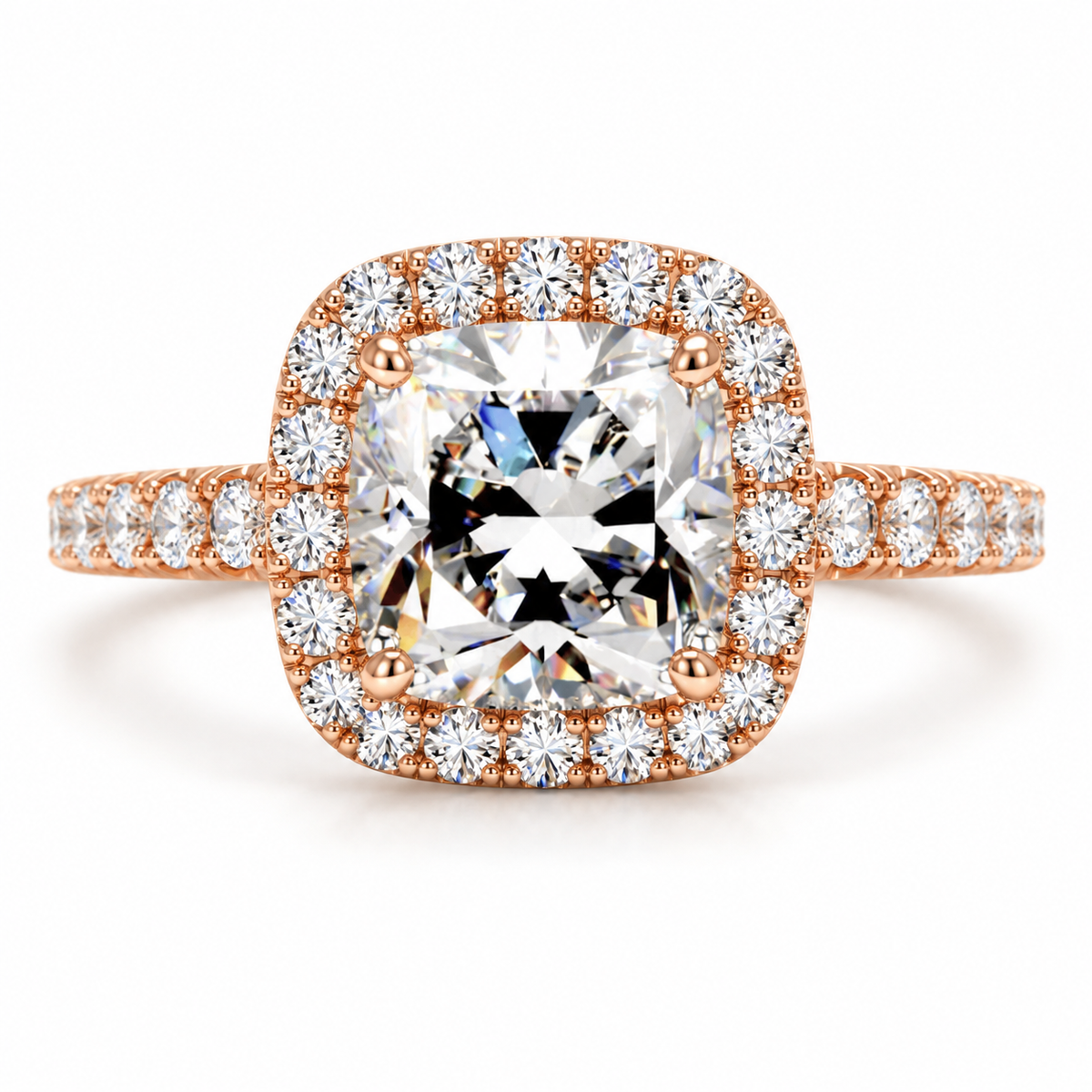 18K rose gold vermeil cushion cut halo engagement ring with sparkling center stone, diamond halo setting, pavé diamond band, and polished luxury finish.