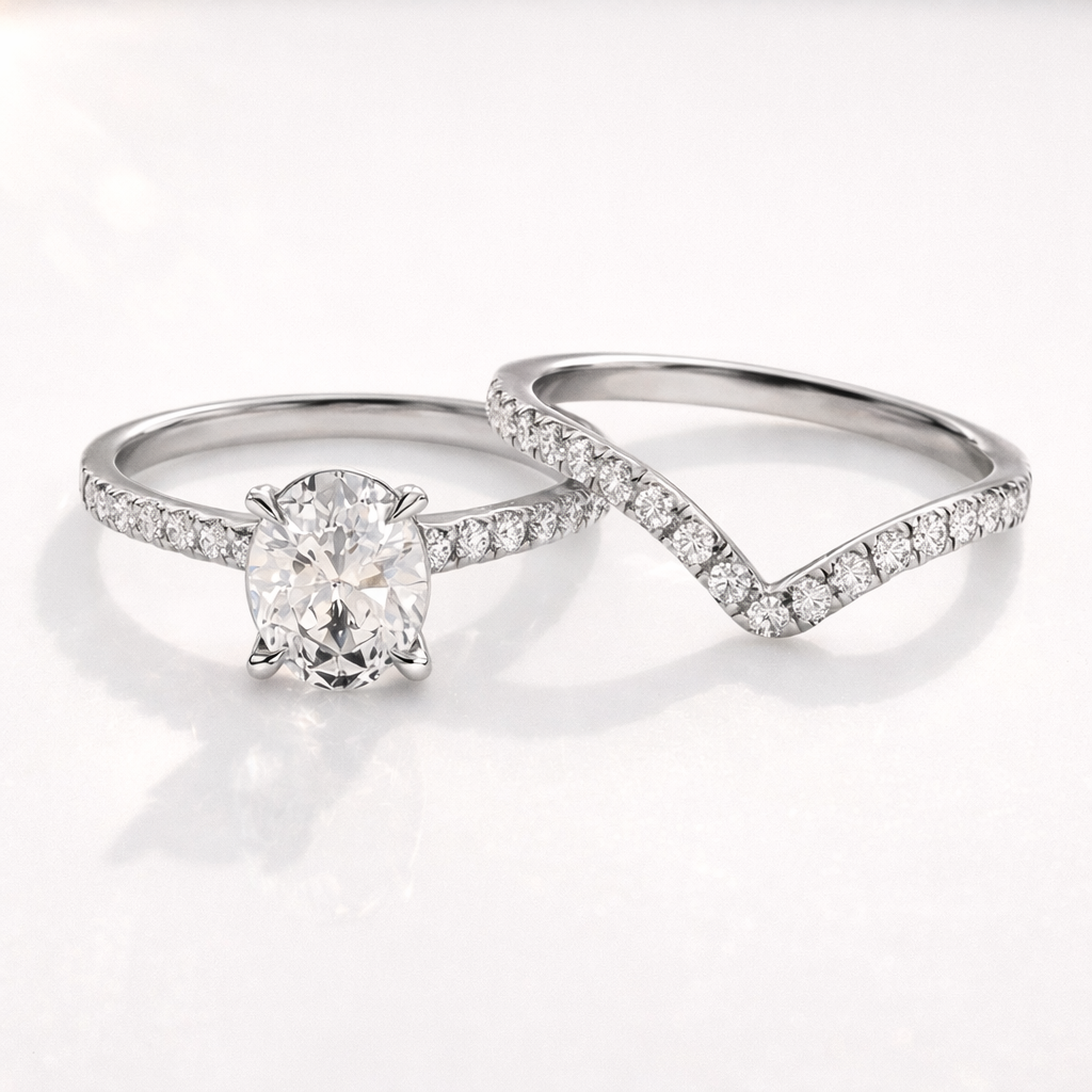 Oval engagement ring with curved wedding band set
