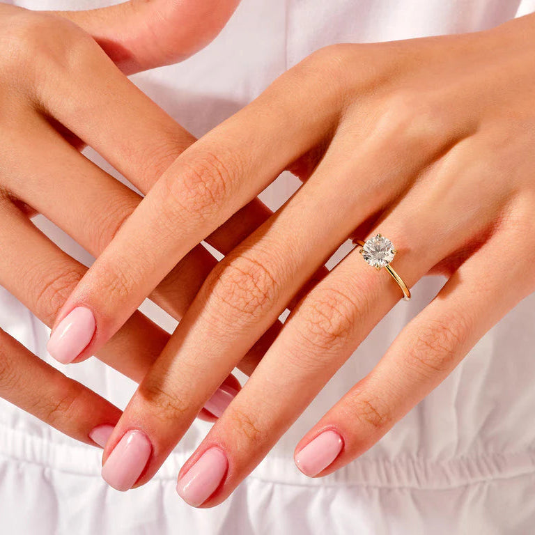 Elegant rose gold engagement ring and wedding band set
