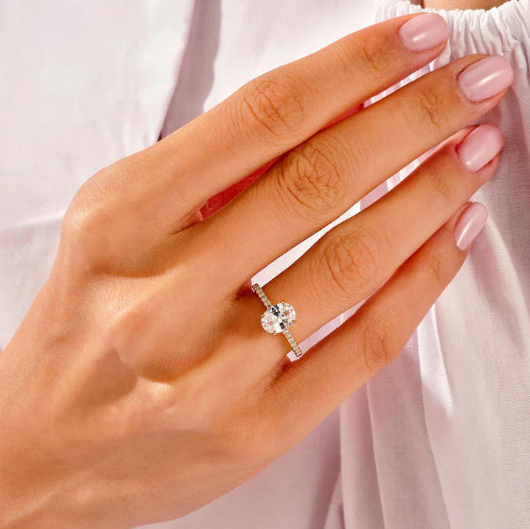 Rose gold oval diamond bridal ring set
