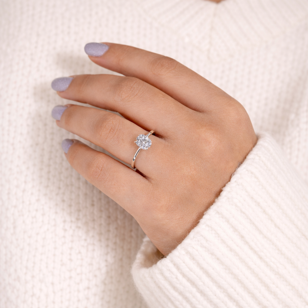 Cushion Cut Diamond Ring Featuring Three Stone Engagement Ring Design
