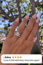 White gold oval diamond ring with round diamond band on hand, with 4-star customer review from Zahra