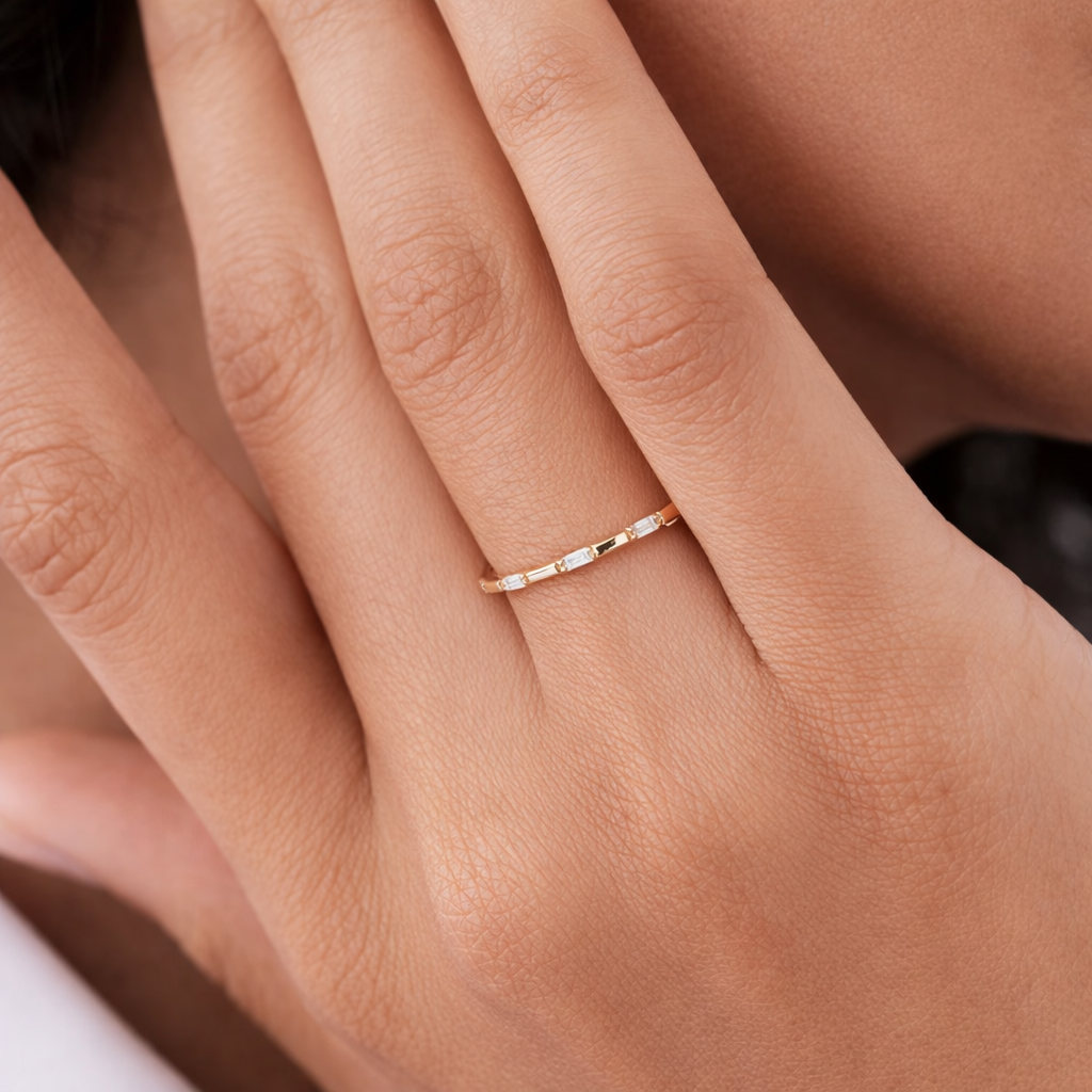 Stackable Gold Wedding Band Featuring Baguette Cut Diamonds
