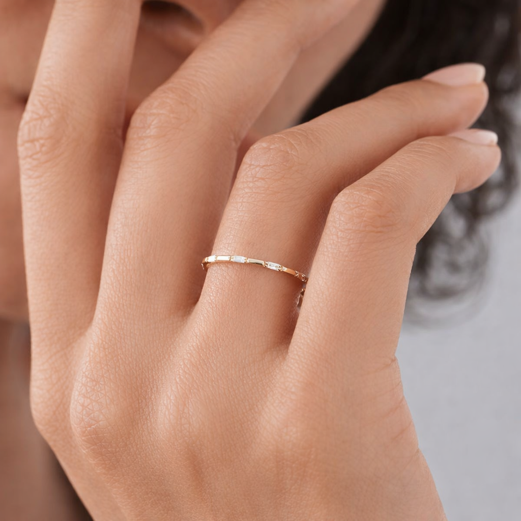 Stackable Gold Wedding Band Featuring Baguette Cut Diamonds
