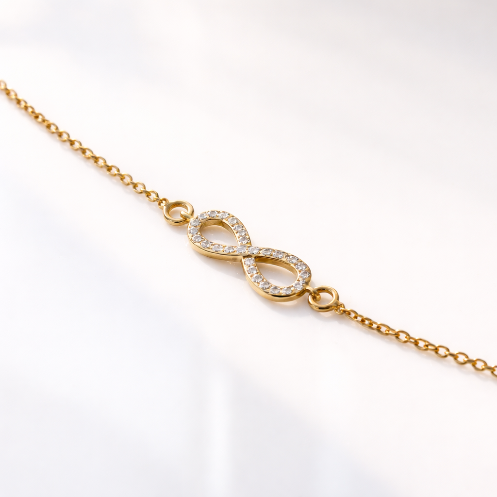 Diamond infinity bracelet in gold
