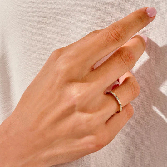 Four claw prong oval cut diamond engagement ring

