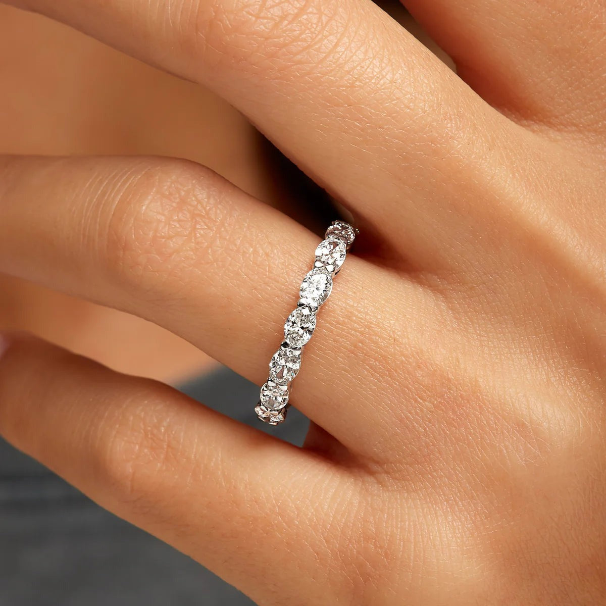 Eternity Wedding Band East West Oval Cut Diamond Band Shared Prong Setting.
