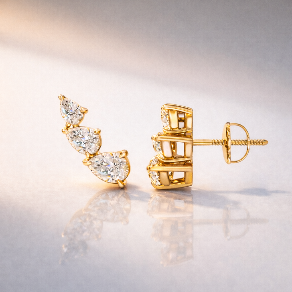 Pear Earrings With Claw Prong Setting And Brilliant Diamonds
