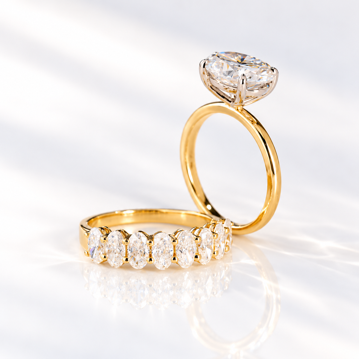 Profile of an east west oval cut colorless ring stone showing its stone depth and four-prong setting