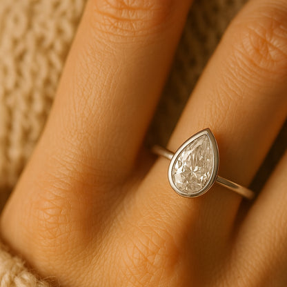 14K White Gold Pear Bezel Moissanite Diamond Engagement Ring Promise Ring Jewelers Near Me 
