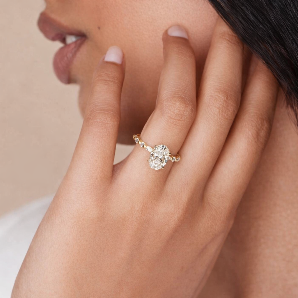 Oval Cut Lab Grown Diamond Ring With Side Stone Detailing
