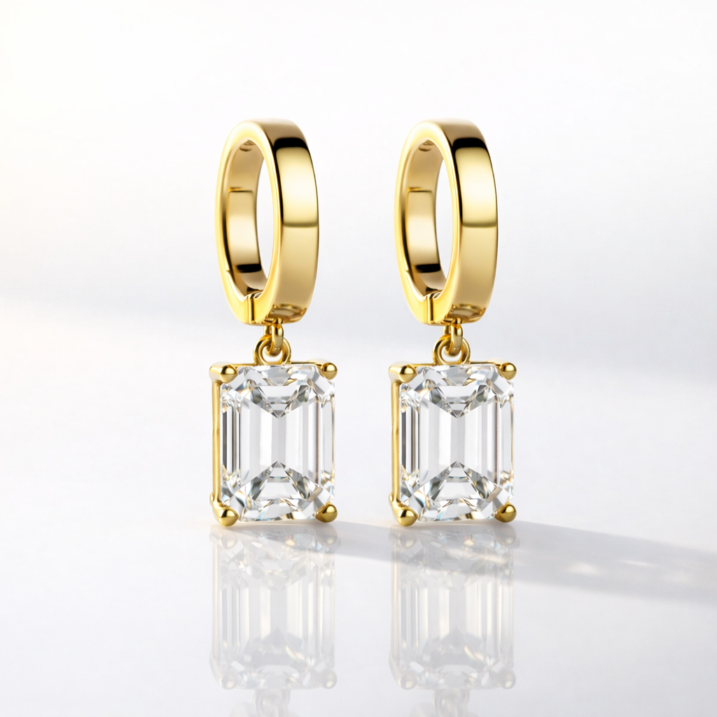 Elegant Emerald Cut Diamond Drop Earrings In Gold Setting
