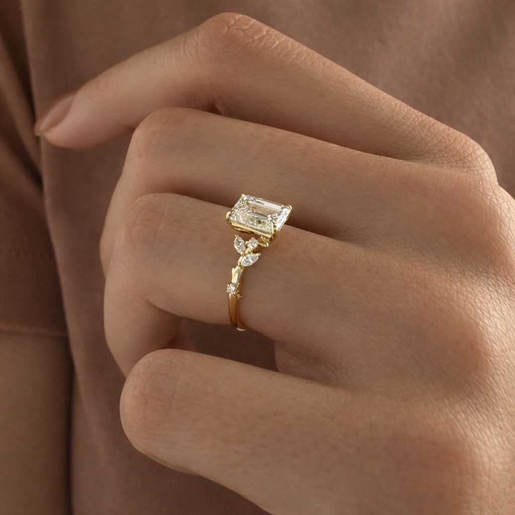 Twig Ring Four Claw Prong Setting Marquise And Round Cut Side Stone.
