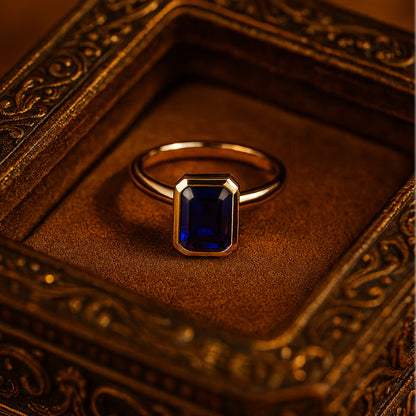 Emerald Cut Blue Sapphire Solitaire Ring In 18K Solid Gold